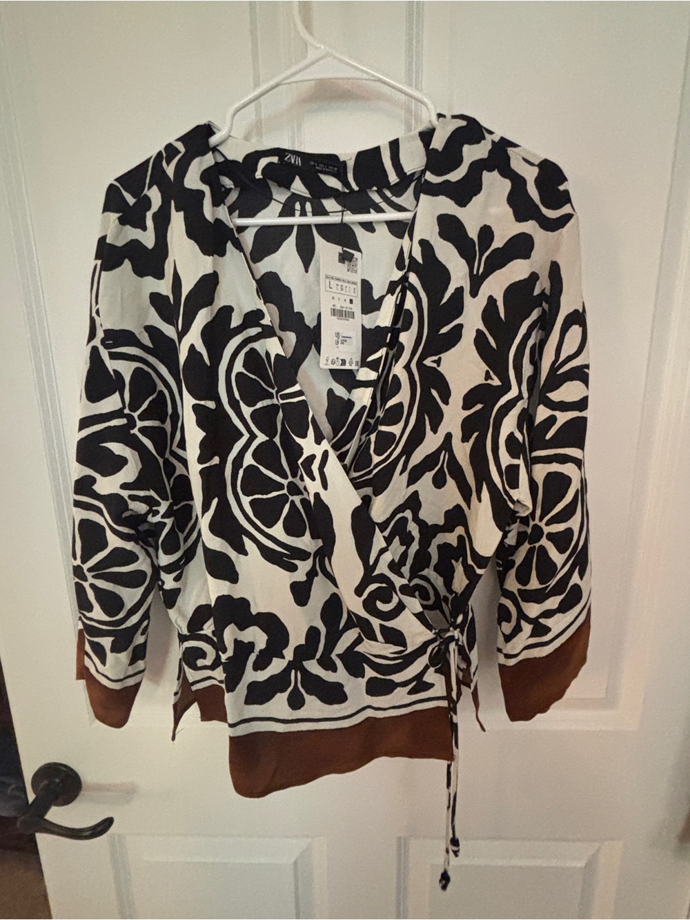 Zara Black and White Floral Wrap Blouse with Brown Trim